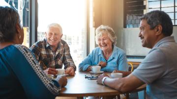 Senior, people and group relax at coffee shop